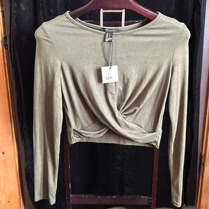 Green midriff, long sleeve shirt.